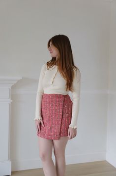 Expertly crafted from a vibrant pink tweed fabric, this skirt adds a pop of color to your wardrobe. Its wrap style offers a versatile fit, perfect for any occasion. Elevate your style with this colorful and timeless piece. pink colorful tweed wrap style mini length true to size zipper closure model is wearing a small Pink Tweed Skirt, High Waist Mini Skirt, Tweed Shorts, Pink Tweed, Mini Accessories, Tweed Mini Skirt, Tweed Skirt, Graphic Tops, Wool Skirt