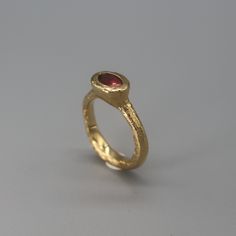 Pink Tourmaline set in gold-plated sterling silver ring. The ring in the photo is size FR 52, but it can be made to order as well, don't hesitate to write me for any custom order. here is an online ring size converter http://www.ringsizes.co/ If you don't know your ring size, check this method: https://www.instagram.com/p/CTmHVMkATEg/ here is an online ring size converter http://www.ringsizes.co/ To see more similar rings, follow this link: https://www.etsy.com/fr/shop/AtelierTiuh?section_id=32800820 Do not hesitate to check my shop on Instagram as well: https://www.instagram.com/atelier_tiuh/ Gold Oval Tourmaline Ring, Gold Tourmaline Jewelry For Anniversary, Gold Tourmaline Jewelry For Weddings, Gold Tourmaline Birthstone Promise Ring, Gold Ruby Ring With Bezel Setting, Open Ring, Gold Tourmaline Birthstone Ring For Promise, Gold Ruby Ring With Bezel Setting, Open Design, Gold Tourmaline Ring In Fine Jewelry Style, Gold Tourmaline Ring Fine Jewelry