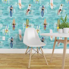 there are many surfboards in the water wallpaper mural set up on this room