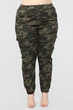 Available in Camouflage Camo Print Fabirc Knit Fabric Full Stretch Oversized Fit Elastic Waistband Front Closure 6 Pocket Detail Elastic Cuff Ankle High Waisted - Cargo Pants - Camo Pants - Camouflage Pants 27.5 inseam. Based on a size Small Disclaimer: Print Placement Will Vary 98% Cotton 2% Spandex Imported | Cadet Kylie Camp Pants in Camo size Medium by Fashion Nova Cheap Utility Camouflage Bottoms, Army Cargo Pants Outfit, Camo Pants Fashion, Army Pants Outfit, Womens Camo Pants, Camp Pants, Army Cargo Pants, High Waisted Cargo Pants, Camouflage Fashion