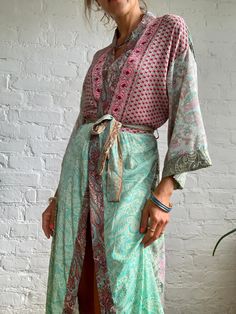 "This is patchwork style robe, with wrap tie closure feels very light and comfy as a daily cover up around the house or outside paired with jeans  Loose and silky, with wide kimono sleeves MEAESURE one size fits most  length 55\" MATERIAL *polyester Please visit also  https://www.etsy.com/shop/AltheaStores For more ideas Thank You for looking" Hippie Wrap Kimono For Beach Cover-up, Spring Patchwork Kaftan, Wrap Robe With Tie Waist, Pink Bohemian Maxi Kimono, Green Bohemian Wrap Kaftan, Hippie Long Green Kimono, Bohemian Spring Kimono With Tie Waist, Bohemian Green Tunic Kimono, Bohemian Green Open Front Kimono