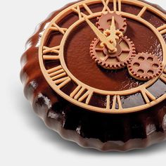 a chocolate cake with a clock on it