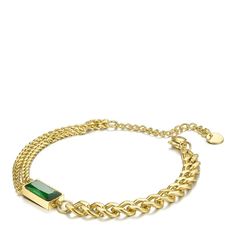 Introducing the You're A Gem Bracelet, a stunning addition to your jewelry collection. Featuring a unique double link bracelet design, this piece exudes sophistication and style. At its center sits a large green stone, adding a pop of color and elegance to any ensemble. Crafted from high-quality 18K gold plated stainless steel, this bracelet is not only durable but also resistant to water and tarnishing, ensuring long-lasting wear. Its hypoallergenic properties make it suitable for even the most Luxury Green Chain Jewelry, Modern Green Bangle Jewelry, Green Luxury Metal Jewelry, Elegant Adjustable Green Gold Bracelet, Green Link Chain Jewelry, Elegant May Birthstone Bracelet With Adjustable Chain, Elegant Green Chain Bracelet, Modern Green Bangle, Elegant Green Chain Bracelet As Gift