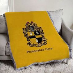 a personalized throw blanket on top of a couch