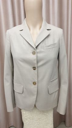 Jil Sander made in Italy  Top luxury women's jacket/blazer  Very high quality  96% fleece wool,  4% elastane  Lining 65% viscosa, 35% polyester  Blazer is in excellent condition ( pockets are  still stitched )  but has few miniature holes on lining ( see last picture )  4 pockets  3 buttons closure  Color beige  Size It-36 US-S Blazer length 58cm/ 22,3/4inches Shoulder to shoulder 39cm/ 15,1/4inches Chest width 45.5cm/ 18inches Waist width 43cm/ 17inches Hip width 47cm/ 18,1/2inches Sleeve length 58cm/ 22,3/4inches Sleeve width 15.5cm/ 6inches All measurements made in flat position Jacket Blazer, Jil Sander, Luxury Women, Women's Jacket, Blazer Jacket, Labour Day, In Italy, Bathing Beauties, Jackets & Coats