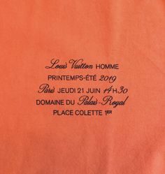 an orange t - shirt with the words louis vuitton home printed on it