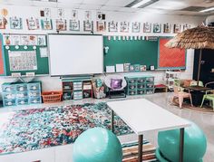 an empty classroom with lots of chairs and desks