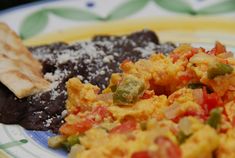 an omelet and some other food on a plate