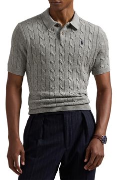 Classic cabling brings old-school details to a polo-style sweater that's knit from breathable cotton and styled to elevate any warm-weather look. 26" length (size Medium) Button half placket Spread collar Short sleeves Ribbed cuffs and hem 100% cotton Dry clean or hand wash, dry flat Imported Fitted Textured Knit Polo Sweater With Polo Collar, Fitted Knit Polo Sweater With Polo Collar, Fitted Textured Knit Polo Sweater With Collar, Casual Wool Sweater With Polo Collar, Fitted Textured Knit Polo Sweater, Fitted Knit Polo Shirt With Polo Collar, Fitted Casual Polo Sweater With Textured Knit, Casual Fitted Polo Sweater With Textured Knit, Fitted Knit Polo Sweater With Collar