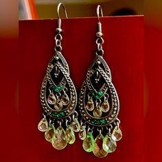 Beautiful Bohemian Drop Earrings, A Really Pretty Design Handmade From Vintage Indian Jewelry With Green Glass Crystals, Gems & Silver Plated, They Catch The Light Beautifully And Are Really Light. Green Is The Color Of Growth, Vitality, Renewal, Compassion, Nature, And Nurturing Stones. Smoke Free Home Fast Shipping Green Metal Chandelier Earrings, Bohemian Metal Teardrop Earrings For Party, Bohemian Teardrop Metal Earrings For Party, Bohemian Silver Crystal Earrings, Bohemian Nickel-free Crystal Earrings For Parties, Silver Bohemian Teardrop Earrings For Party, Vintage Indian Jewelry, Crystals Gems, Vintage Indian