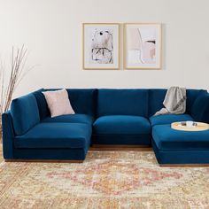 a blue sectional sofa in a living room