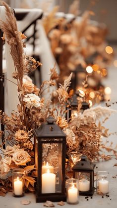 candles and flowers are sitting on the table