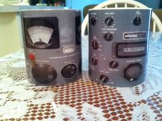 two radio speakers sitting on top of a table