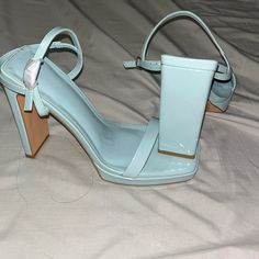 Brand New, Never Worn, Shiny Baby Blue Heels. Trendy Light Blue Block Heel Heels, Trendy Light Blue High Heels, Trendy Light Blue Heels With Wrapped Heel, Trendy Blue Ankle Strap Heels, Trendy Blue Heels With Wrapped Heel, Trendy Light Blue Party Heels, Chic Light Blue Heels, Spring Blue Heels For Night Out, Blue Heels For Spring Night Out