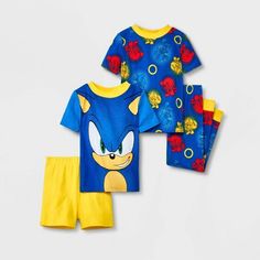 Prep your speedster for fun dreamland adventures in this 4-Piece Sonic the Hedgehog Pajama Set. Crafted from 1x1 rib 100% cotton, this pajama set includes two fitted pairs for a soft feel and all-night cozy comfort. One pair includes a short-sleeve tee featuring an illustration of Sonic on the front with solid sleep shorts. The other pair includes a short-sleeve tee and pajama pants, both featuring allover illustrations of Sonic, Miles and Knuckles. Great as coordinated sets, you can help them m Fun Cotton Sleep Sets, Fun Cotton Sleepwear Set, Fun Cotton Sets With Cartoon Print, Fun Cotton Sets With Character Print, Cotton Sleep Sets With Character Print, Cotton Sets With Character Print In Fun Style, Cotton Sleepwear Sets With Character Print, Fun Cotton Sets With Graphic Print, Cotton Bedtime Sets With Character Print