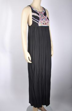 Great Pre-owned Condition Size: X-Small Color: Black Relaxed Fit Elastic Back Dropped Armhole Boho Bodice detail with Embroidered Arrows Detail Adjustable Spaghetti Straps 100% Viscose Hand Washing Recommended Casual Summer Maxi Dress With Embroidered Hem, Casual Embroidered Maxi Dress For Vacation, Casual Cotton Maxi Dress With Floral Embroidery, Casual Embroidered Cotton Maxi Dress, Casual Maxi Dress With Embroidered Hem, Casual Cotton Embroidered Maxi Dress, Black Bohemian Embroidered Sleeveless Dress, Casual Floral Embroidered Maxi Dress For Festival, Black Floral Embroidered Beach Maxi Dress