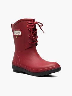 a pair of red rain boots on a white background