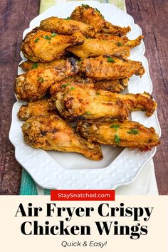 air fryer fried chicken wings on a white plate with text overlay that reads, air fryer fried chicken wings crispy and fried