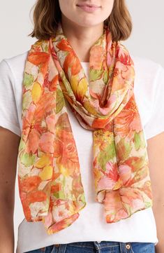 A colorful floral pattern sweeps across a lightweight gauzy scarf that's sure to turn heads. 100% polyester Hand wash, line dry Imported Casual Floral Print Silk Scarf For Spring, Casual Silk Scarf With Floral Print For Spring, Casual Floral Print Scarves For Spring, Casual Floral Silk Scarf For Spring, Summer Silk Scarf With Floral Print One Size, Summer Floral Print Silk Scarf One Size, Multicolor Floral Silk Scarf For Beach, Multicolor Floral Print Scarf For Beach, Spring Floral Print Silk Scarf