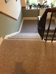 the stairs in this house are clean and ready for us to go down them,