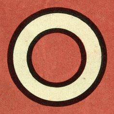 a black and white circle is on a red background with the letter o in it