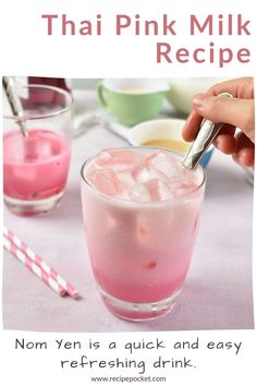 there is a pink drink with ice in it