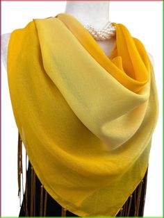 Yellow gradient chiffon scarf - a radiant accessory to brighten up your style. This exquisite scarf effortlessly combines the timeless elegance of chiffon with the vivacious charm of a yellow gradient design. The square shape offers endless possibilities for creative draping and styling, allowing you to express your unique personality. Its generous size ensures versatility, making it the perfect addition to your wardrobe year-round. Adding an extra touch of flair, delicate tassels gracefully ado Chic Scarf, Yellow Gradient, Chic Scarves, Gradient Design, Chiffon Scarf, Scarf Gift