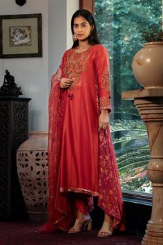 Red asymmetric kurta with floral printed side panel embellished by sequins and swirl thread embroidery. Comes with dhoti pant and a printed dupatta. - Aza Fashions Festive Red Palazzo Set With Traditional Drape, Red Palazzo Set For Festive Occasions, Red Festive Traditional Drape Palazzo Set, Festive Red Traditional Drape Palazzo Set, Red Palazzo Set With Resham Embroidery For Eid, Eid Red Palazzo Set With Resham Embroidery, Embroidered Slub Silk Salwar Kameez For Party, Red Slub Silk Palazzo Set For Navratri, Party Embroidered Slub Silk Salwar Kameez