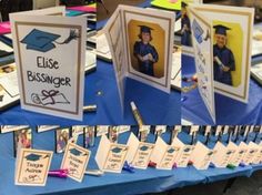 graduation cards are displayed on a table