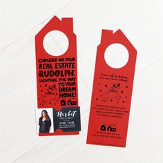 two red door hangers with black and white designs on them, one has an image of a woman