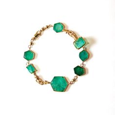 14k and 10k yellow gold Hex Repell Yoruba Link bracelet featuring 34.00 carats of multicut MUZO emeralds, by L'ENCHANTEUR. Gold Hex, Nyc Jewelry, Goddess Of Love, Exquisite Jewelry, Jewelry Store, Gemstone Colors, Ring Necklace, Link Bracelets, Diamond Shapes