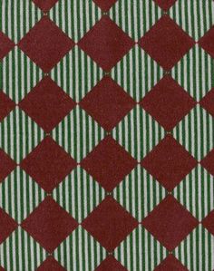 a red and green checkered fabric with white stripes