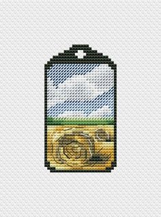 a cross stitch pattern with an image of a car on the front and back side