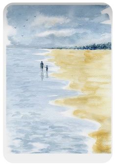 two people are walking on the beach near the water