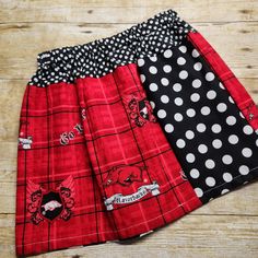 This skirt is perfect for the little Razorback fan in your life. Super cute paired with a custom made shirt or bodysuit! Skirt shown in the main photo is available in limited sizes and quantities. I do not mass produce these, so usually I only have what is shown in stock. I can still make team skirts and you are welcome to contact me for a custom order if your size is not available, but fabrics used will vary from those used on these skirts. You can also contact me about making a skirt for anoth Cute Cotton Skort For School, Cute Fitted Skirt For School, Cotton School Skort With Lined Skirt, Casual Cotton Cheerleading Skirt, Cotton Skort For School, Cotton Lined Skort For School, Cotton Skort With Lined Skirt For School, Casual Cotton Skirt For Cheerleading, Fitted Cotton Skirt For Cheerleading