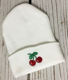 Keep your head warm with this sweet embroidered cherry beanie! Design: Beautifully embroidered with cherries Condition: BRAND NEW-NEVER WORN Size: One Size Fits All Color: Black or Choose your favorite color from the drop down menu Material: 100% Acrylic All items are shipped via usps first class mail Please email me if you have any questions. Prunus Cerasus, Caps Design, Wild Cherry, Embroidered Beanie, Cap Designs, Embroidered Hat, Embroidered Hats, Dad Caps, Cherry Tree