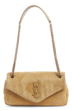 An iconic YSL insignia brands the flap of this calfskin-suede bag in a softly structured silhouette with a pull-through strap for carrying versatility. Magnetic-snap flap closure Pull-through chain strap Interior zip pocket Leather Made in Italy Designer Handbags Designer Suede Shoulder Bag With Detachable Strap, Designer Suede Shoulder Bag With Gold-tone Hardware, Elegant Suede Shoulder Bag With Palladium Hardware, Elegant Suede Bag With Palladium Hardware, Designer Suede Shoulder Bag For Formal Occasions, Luxury Suede Shoulder Bag With Detachable Strap, Luxury Suede Shoulder Bag, Luxury Bag With Suede Lining, Luxury Formal Bag With Suede Lining