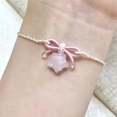 Pink Stone Bowknot Star Bracelet Add an elegant touch to any outfit with our adorable Pink Stone Bowknot Star Bracelet! Made with delicate pink stones and a charming bowknot and star design, this bracelet is perfect for adding a touch of cuteness to your ensemble. A must-have for all fashion lovers!