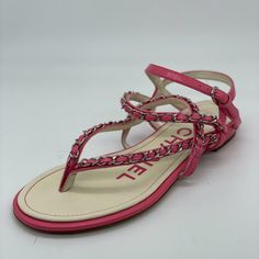 These Calfskin Leather Sandals Feature A Silvetone Intervowen Chain Embellishment. Ankle Strap With Chanel Embossed Buckle. Padded Leather Insole. Leather Sole. Made In Italy. Designer Color: Pink. Size: 37.5 C (Wide Width) Eu (Insole Measures 9.5" Long, 3.5" Wide ). Typically Chanel Shoes Run Small. Brand New In The Box. Chanel Thong Sandals, Dad Sandals, Chanel Espadrilles, Chanel Black And White, Raffia Sandals, Chanel Sandals, Yellow Sandals, Pink Chanel, Pink Sandals