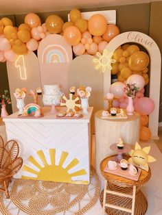 a birthday party with balloons and decorations