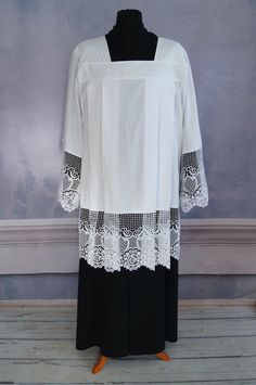 "Traditional square neck Priest Surplice/ Cotta with pleats Manufactured with high quality stain resistant fabrics: Gabardine (stretch-100% polyester)/ A blend of cotton and polyester (50%/50 Percale (100% cotton) The used materials are airy and crease-resistant, applicable for standart washing and ironing, which altogether make the surplice practical and suitable for a frequent use. The quality of the fabrics significantly helps to maintain the colour and shade given to the surplice. High quali White Embroidered Chasuble For Church, Cassock Priest, White Priest Robes, Priestly Garments, Priest Stole Pattern, Priest Robes, Catholic Vestments, Liturgical Vestments, Priest Stole