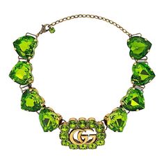 A signature emblem of the House, the initials of its founder Guccio Gucci define this necklace, embellished with heart-shaped crystals. Adding a refined feel, sparkling crystals frame the logo crafted from metal with an aged gold finish. Gold-tone/green Metal with aged finish Signature Double G logo Green heart-shaped crystals Lobster claw fastening Composition: Crystal, Metal Adjustable length from 12.6"/32 cm to 16.5"/42 cm Designer Style ID: 627772I4769 Made in Italy Double G Logo, Fall Rings, Guccio Gucci, Gucci Jewelry, G Logo, Peridot Necklace, Jewellery Designer, Gucci Fashion, Designer Fashion Jewelry