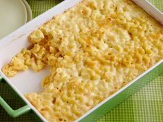 a casserole dish with macaroni and cheese in it on a table