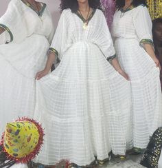 This Beautiful Ethiopian Traditional clothe is made from 100% cotton free size very comfortable it's have so much room  under the waste it gives more grace when you wore it  and it can be worn for any special program or party it is two piece with the (NETELA) all season approprate to be worne Cotton Maxi Dress For Traditional Ceremonies, Festive White Cotton Maxi Dress, Traditional Cotton Party Dress, Festive Cotton Maxi Dress For Festivals, White Cotton Festival Sets, Traditional Flowy Dresses For Festivals, White Cotton Party Maxi Dress, White Party Dress For Festivals, White Party Festival Dresses