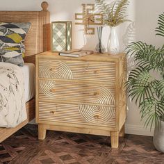 a bedroom scene with focus on the chest of drawers and plants in vases next to it