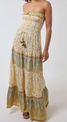 Made in Italy Bandeau Floral and Shell Maxi Dress, is easy to wear for a day time out or an evening out with some lovely wedges. Would look great with alittle denim jacket if a bit cooler and great to wear on a hot summer's day.  Yellow.   Sizes S-8/10 M-12/14 L- 14/16 Bohemian Summer Maxi Dress With Elastic Waistband, Bohemian Spring Dress With Elastic Waistband, Bohemian Summer Dresses With Elastic Waistband, Casual Boho Print Maxi Dress For Brunch, Spring Cotton Maxi Dress With Elastic Waistband, Casual Summer Maxi Dress With Elastic Waistband, Casual Maxi Dress With Elastic Waistband For Summer, Bohemian Dress With Elastic Waistband For Brunch, Casual Spring Maxi Dress With Elastic Waistband