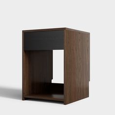 a wooden table with a black drawer on the bottom and one shelf open to reveal an object