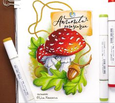 a drawing of a mushroom with leaves and acorns next to marker pens on a table