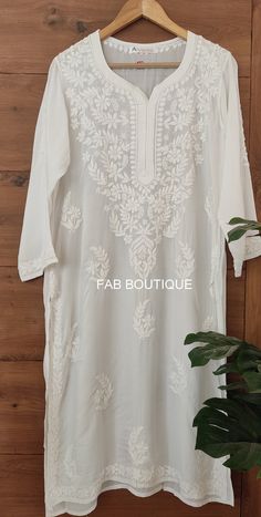 Description ▪ Kurti Fabric: Modal ▪ Kurti Length: 44-46 Inches ▪ Sleeves: 3/4 Sleeves ▪ Style: Straight Kurti ▪ Occasions: Party Wear, Office Wear, Festive Wear ▪ Garment Care: Hand Wash Only ▪ Price Includes: 1x Kurti White Intricately Embroidered Festive Kaftan, Fitted White Kaftan For Transitional Season, Festive White Intricately Embroidered Kaftan, Fitted Kaftan For Wedding In Transitional Season, Wedding Fitted Kaftan For Spring, Fitted Wedding Kaftan For Spring/fall, Fitted Cotton Traditional Kaftan, Traditional Fitted Cotton Kaftan, Festive White Kaftan With Pallu Detail