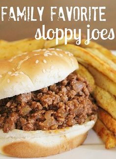 a close up of a sandwich and french fries on a plate with the words family favorite sloppy joes